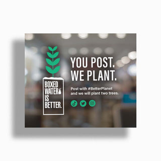 You Post We Plant next to boxed water carton with a tree inside. Post with #betterplanet and we will plant two trees with Instagram, Twitter and Tiktok icons