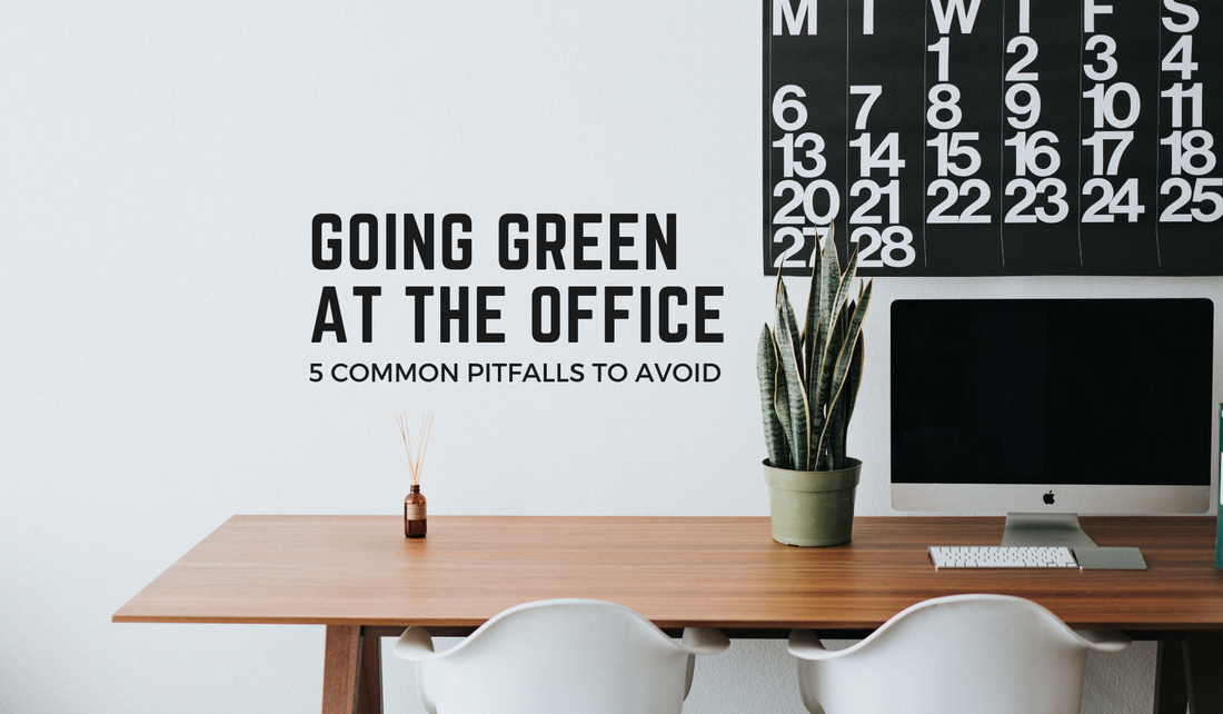 an office table with text reading: "going green in the office" 