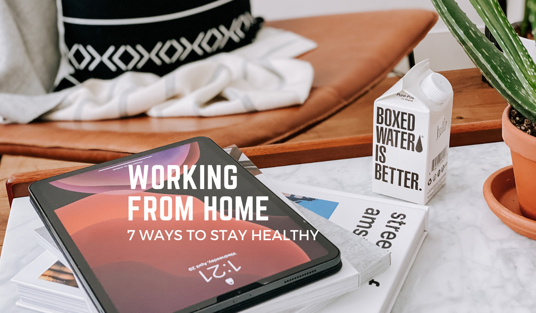 250ML Boxed Water on a table with an I pad with text reading "Working from home" 