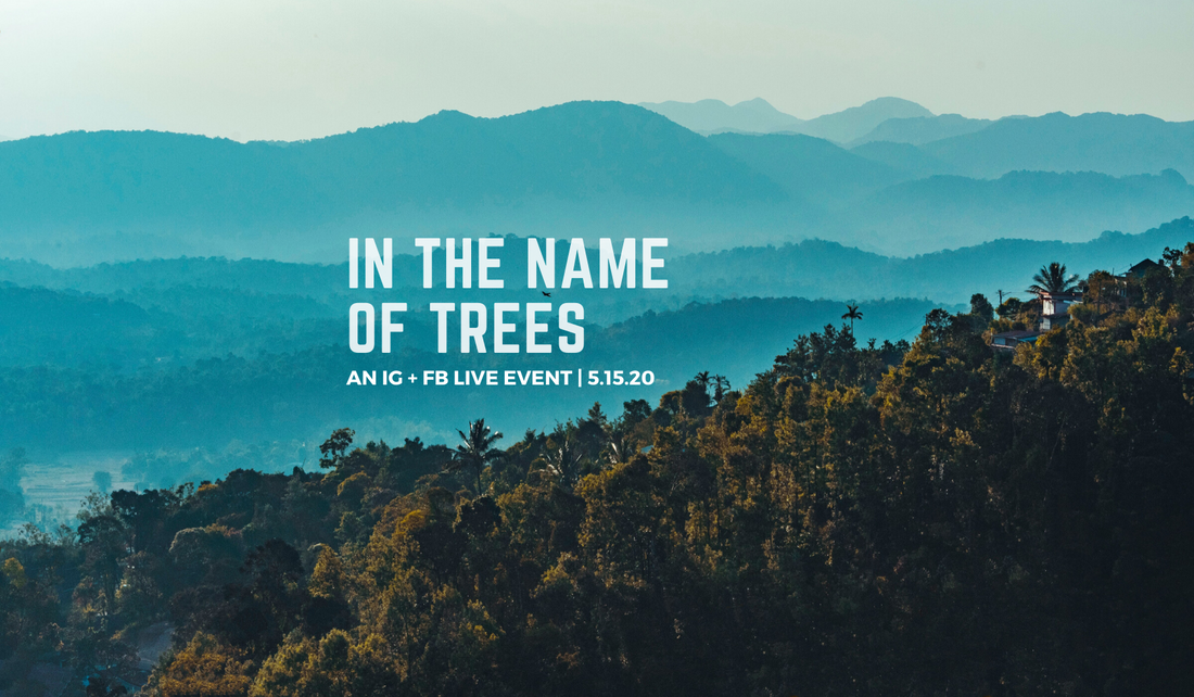 Mountain landscape with text overlayed reading "In the name of the trees" 