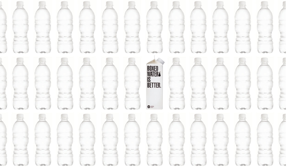 Grid of plastic water bottles with one Boxed Water in the middle 