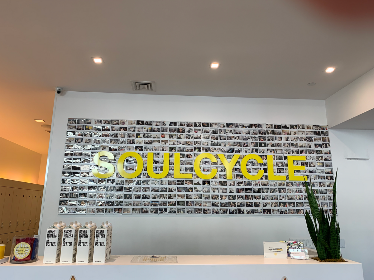 SoulCycle studio with Boxed Water on counter
