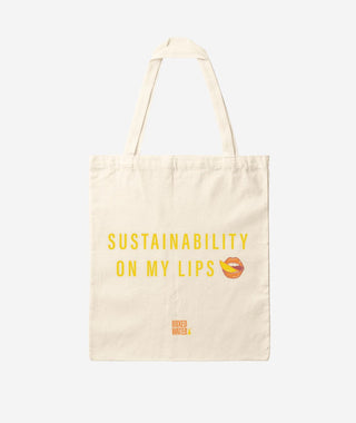 canvas tote with orange text and lips icon