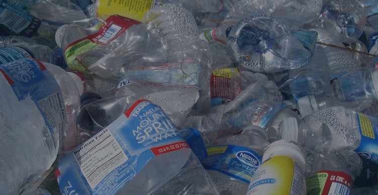 pile of crumpled plastic bottles