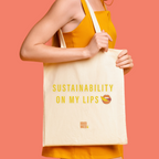 woman with canvas tote bag